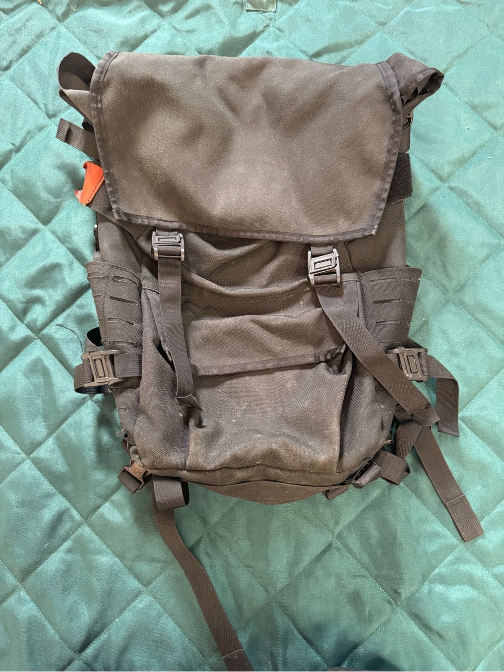 Men's Black Tactical Roll-Top Backpack with Multiple Straps